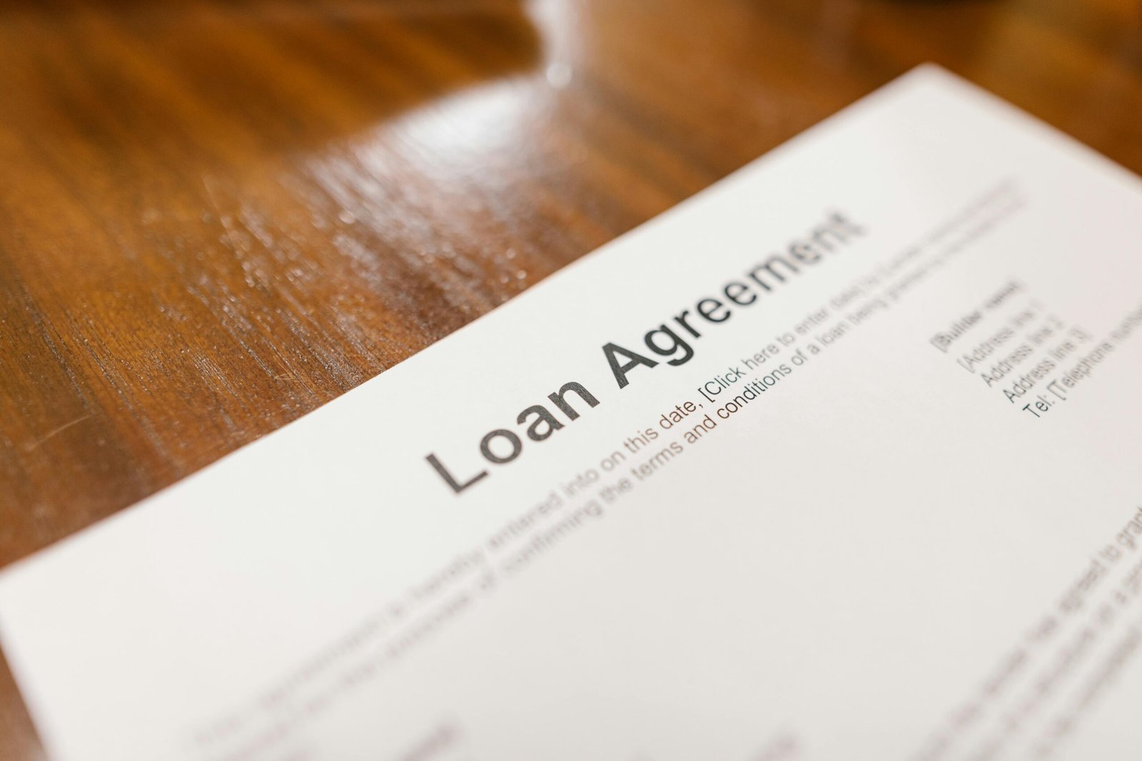 A loan agreement form on a table